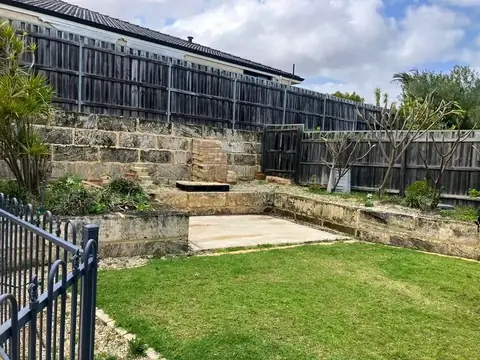 Backyard before and after a full makeover (before 2 of 3)